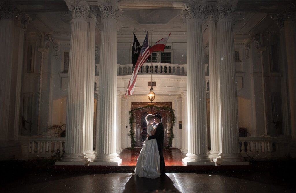 portland White House at night with a bride and groom